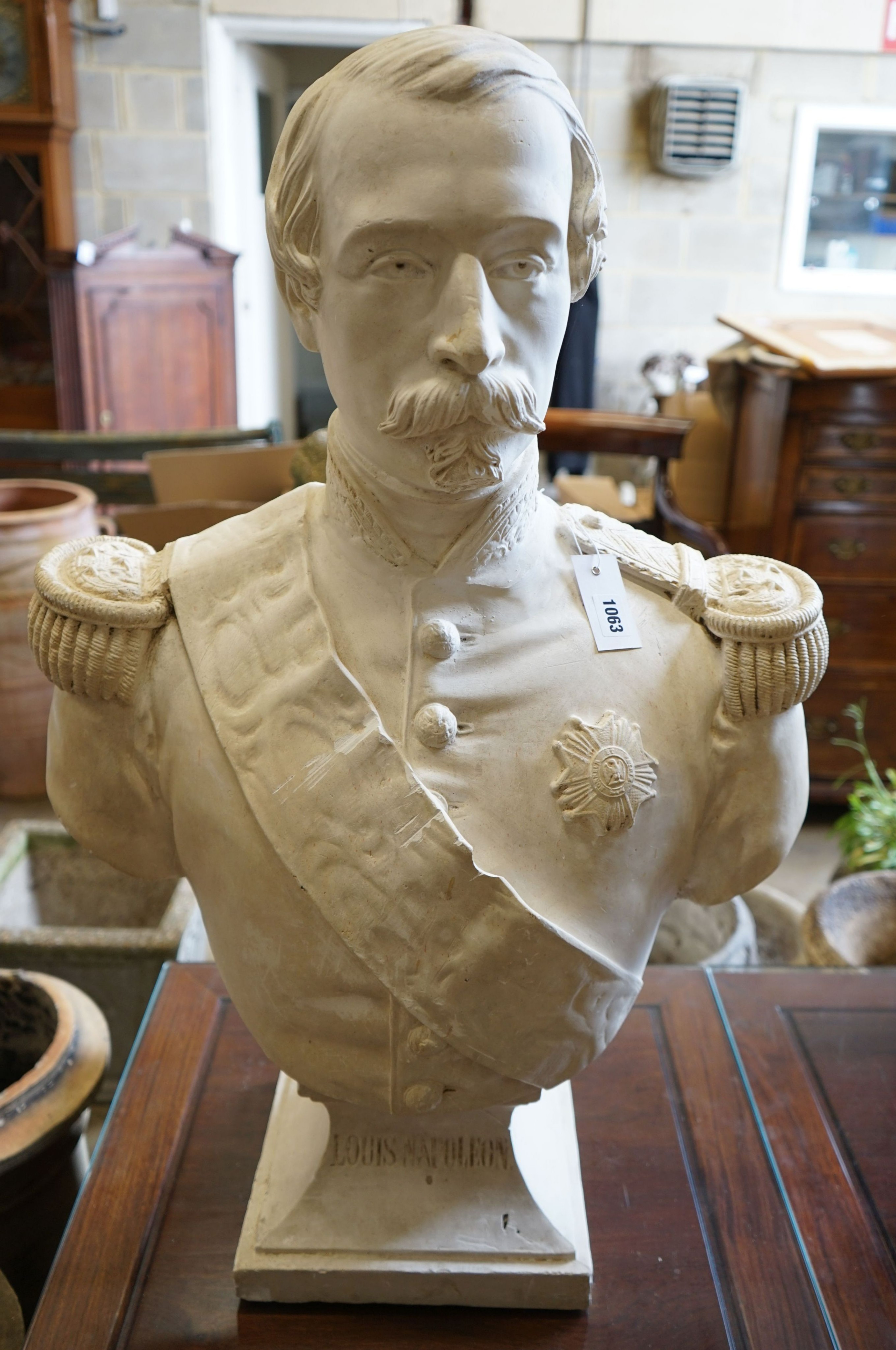 A 'Louis Napolean' faux marble bust, height 82cm